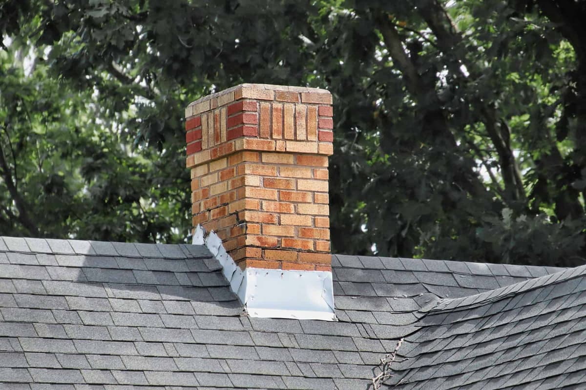 Chimney inspection and repair on a residential roof