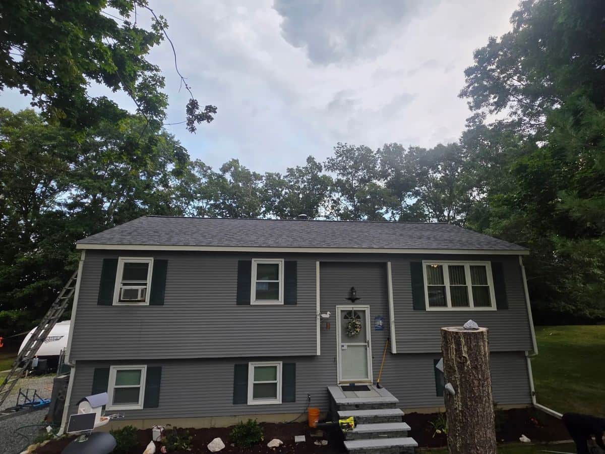 Raised ranch in Coventry, RI with a new dark gray shingle roof