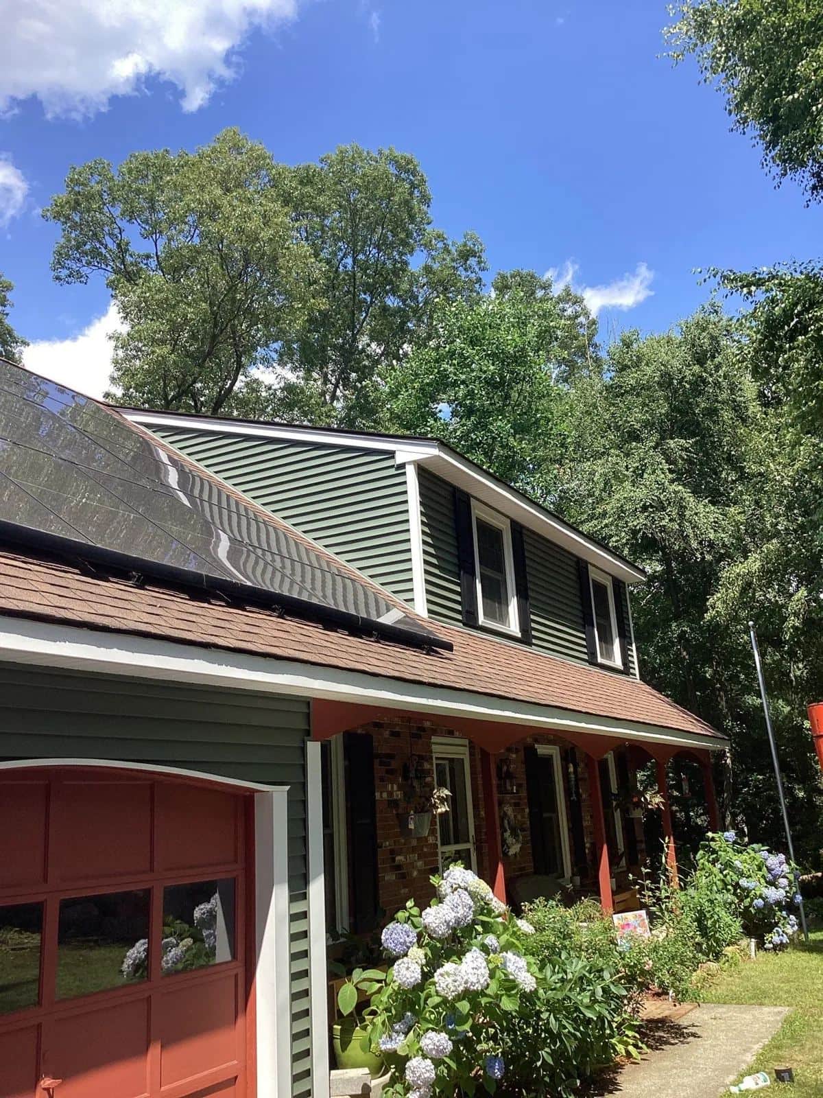 Gales Ferry, CT colonial with worn red siding before, and new sage green clapboard siding with white trim after