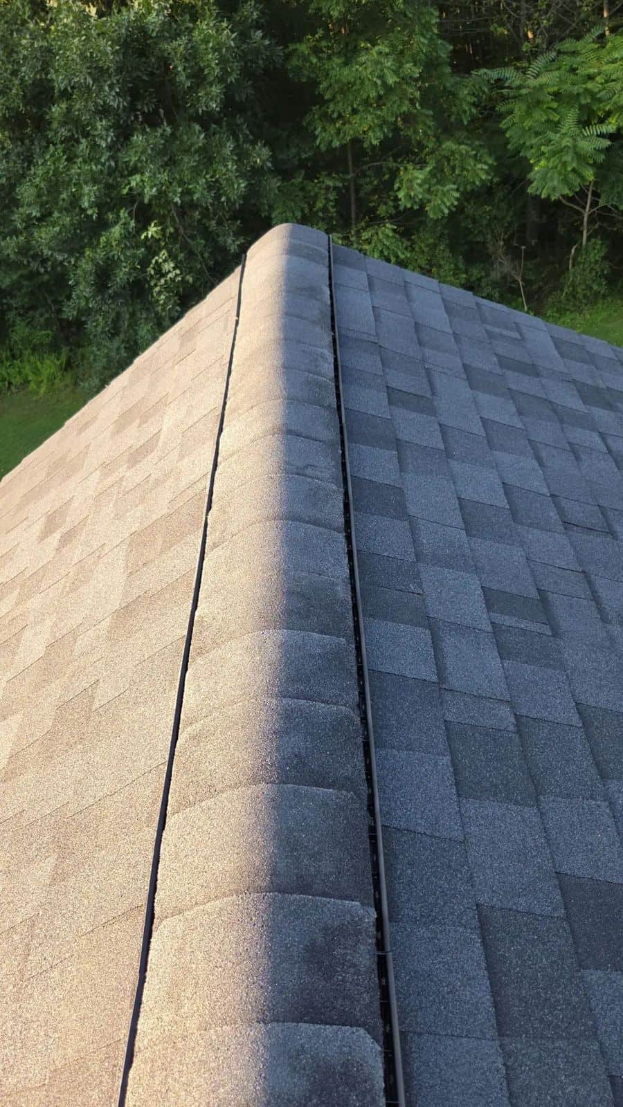 Close view of a new gray shingle roof in Pomfret Center, CT
