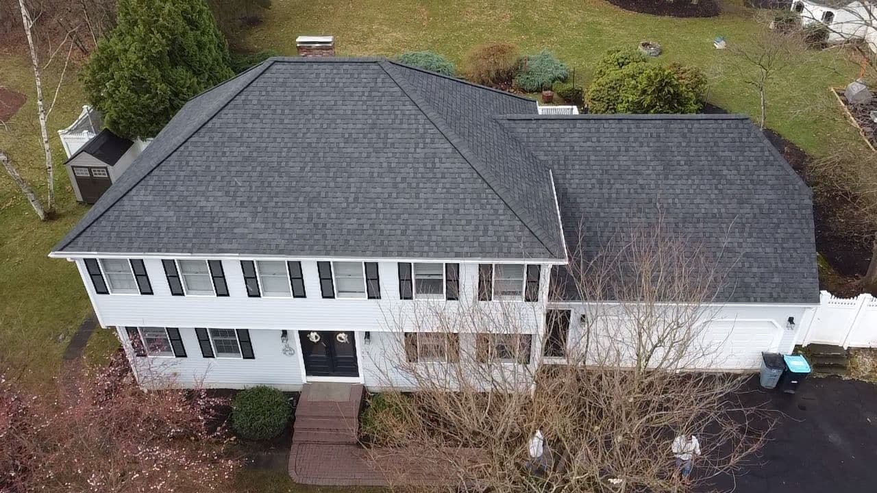 Completed roof replacement on a home with new CertainTeed Landmark architectural shingles