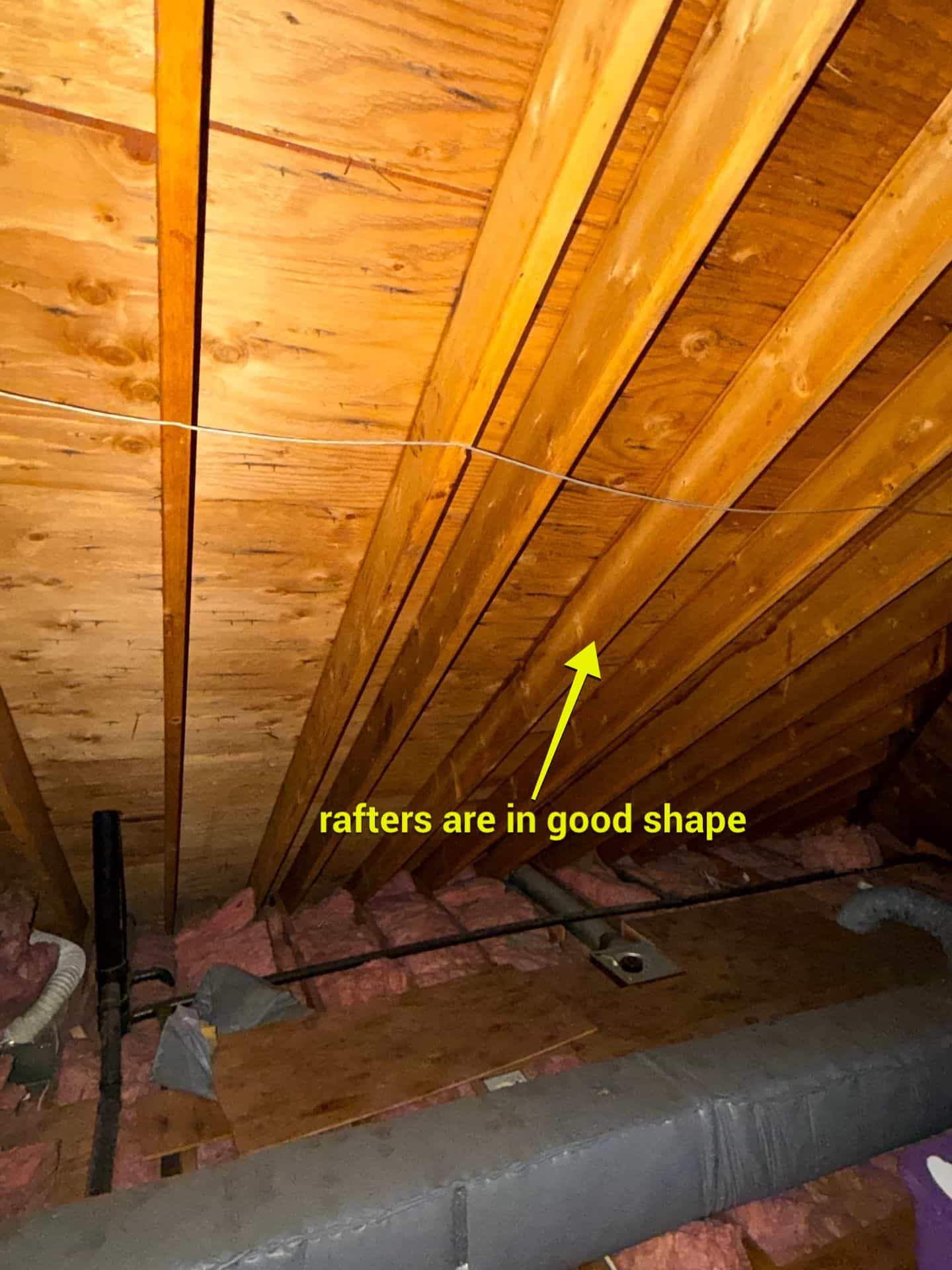 Annotated 360° Roof Report photo from inside the attic confirming rafters are in good condition