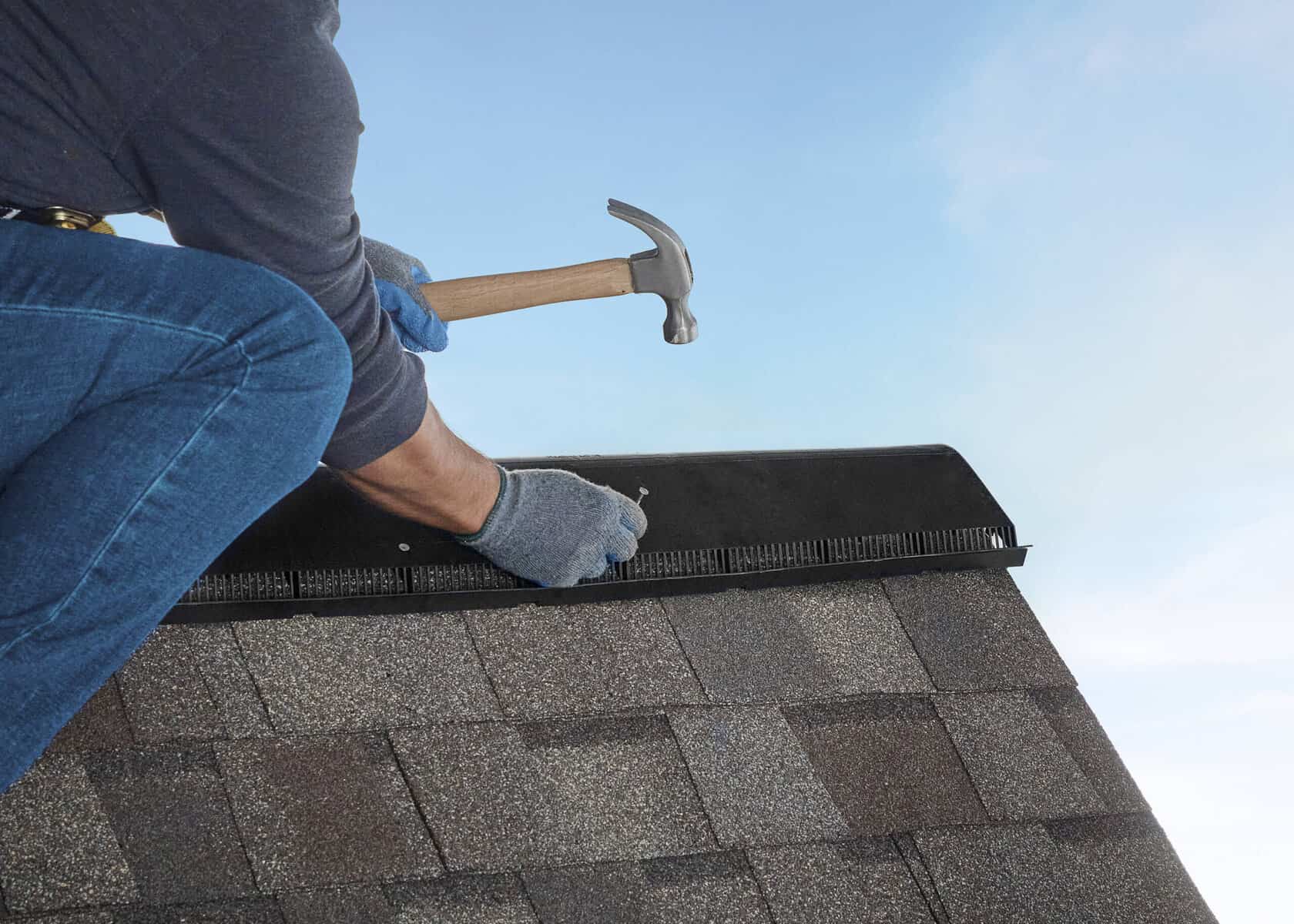 Ridge vent installed on residential roof peak