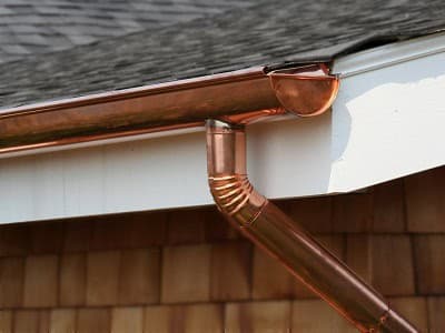 Seamless gutter system installed on a residential roof