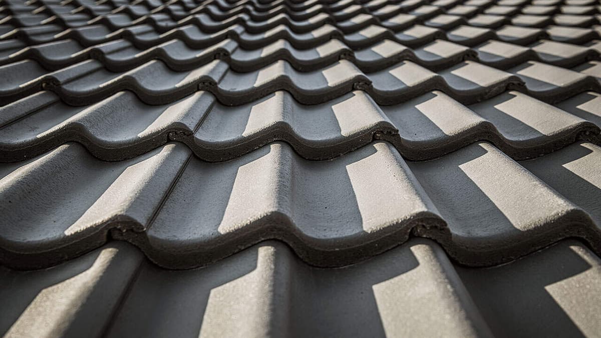 Insulation being installed in a residential attic